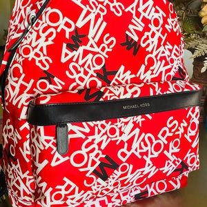 Micheal Kors bag pack . Too big for me